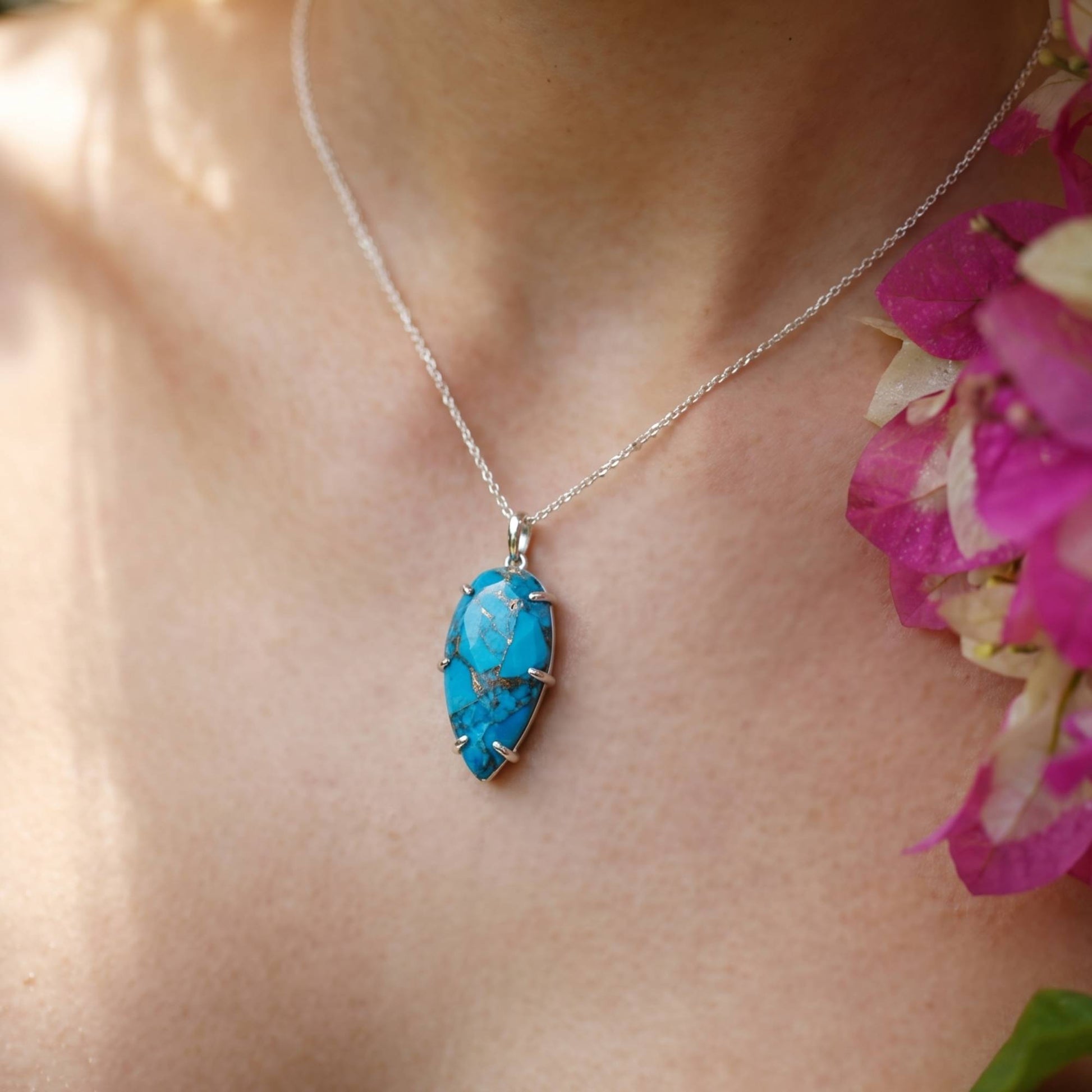 Turquoise gemstone pendant necklace detail